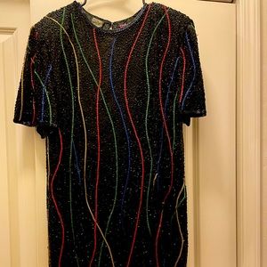 Stunning vintage silk Neiman Marcus beaded dress. Falls just below the knees.